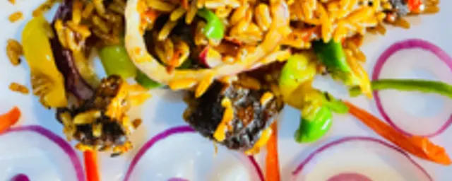 Asun Jollof Rice with Plantains